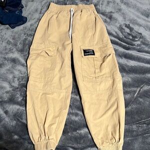 Unisex Cargo tan pants size 6. Youth. 97% cotton